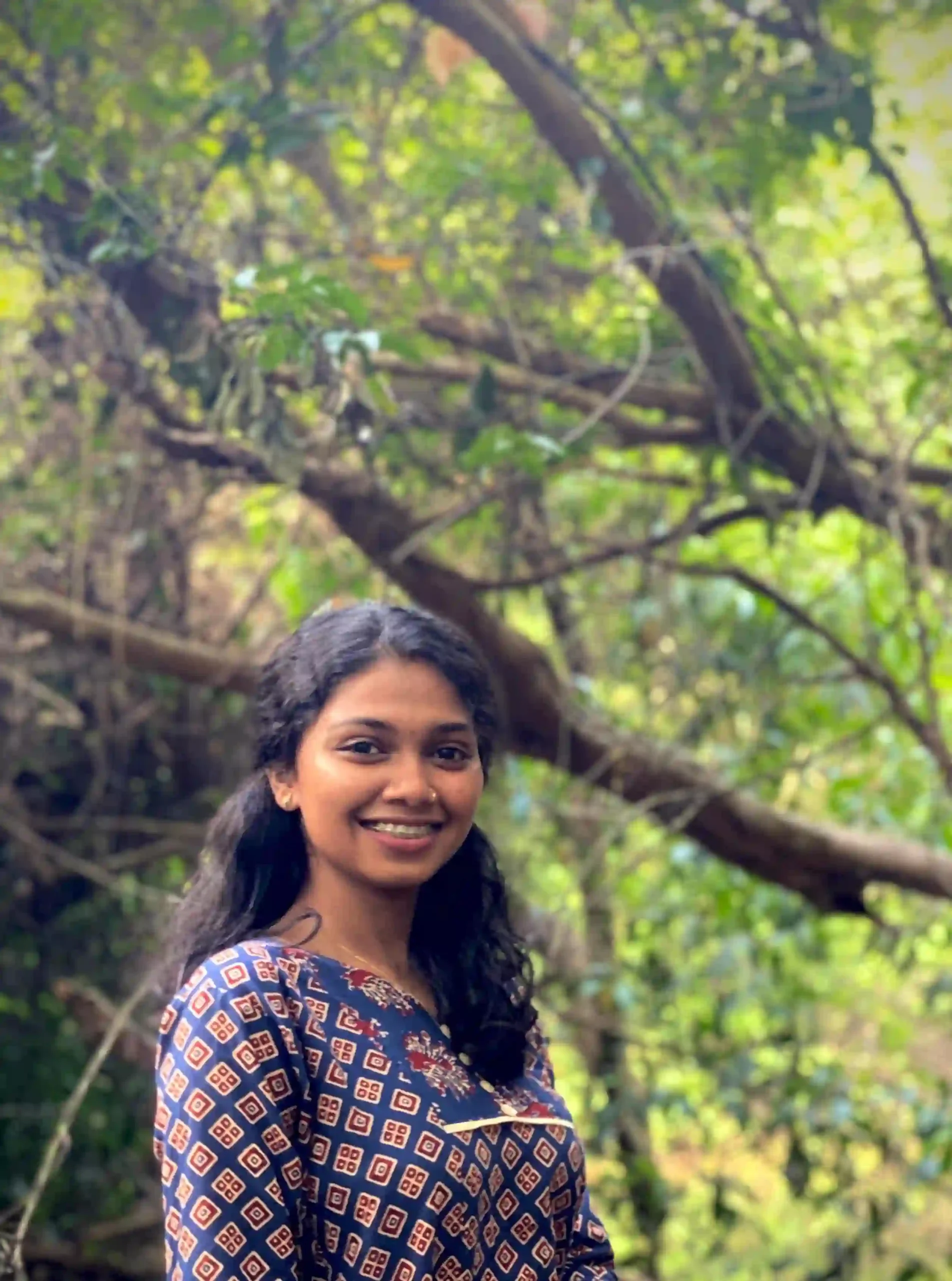 a girl stand on a tree digital marketer in alappuzha